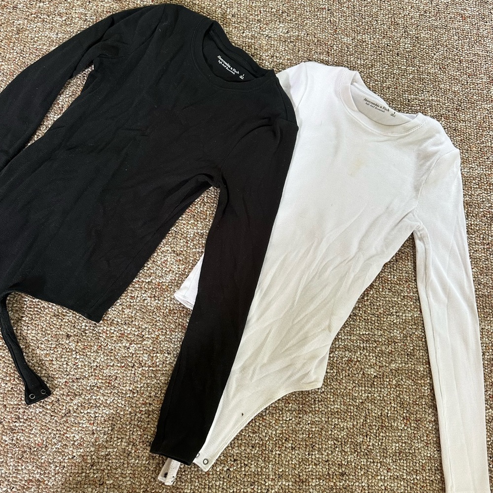 Black and White Long Sleeve Tie Front Bodysuits